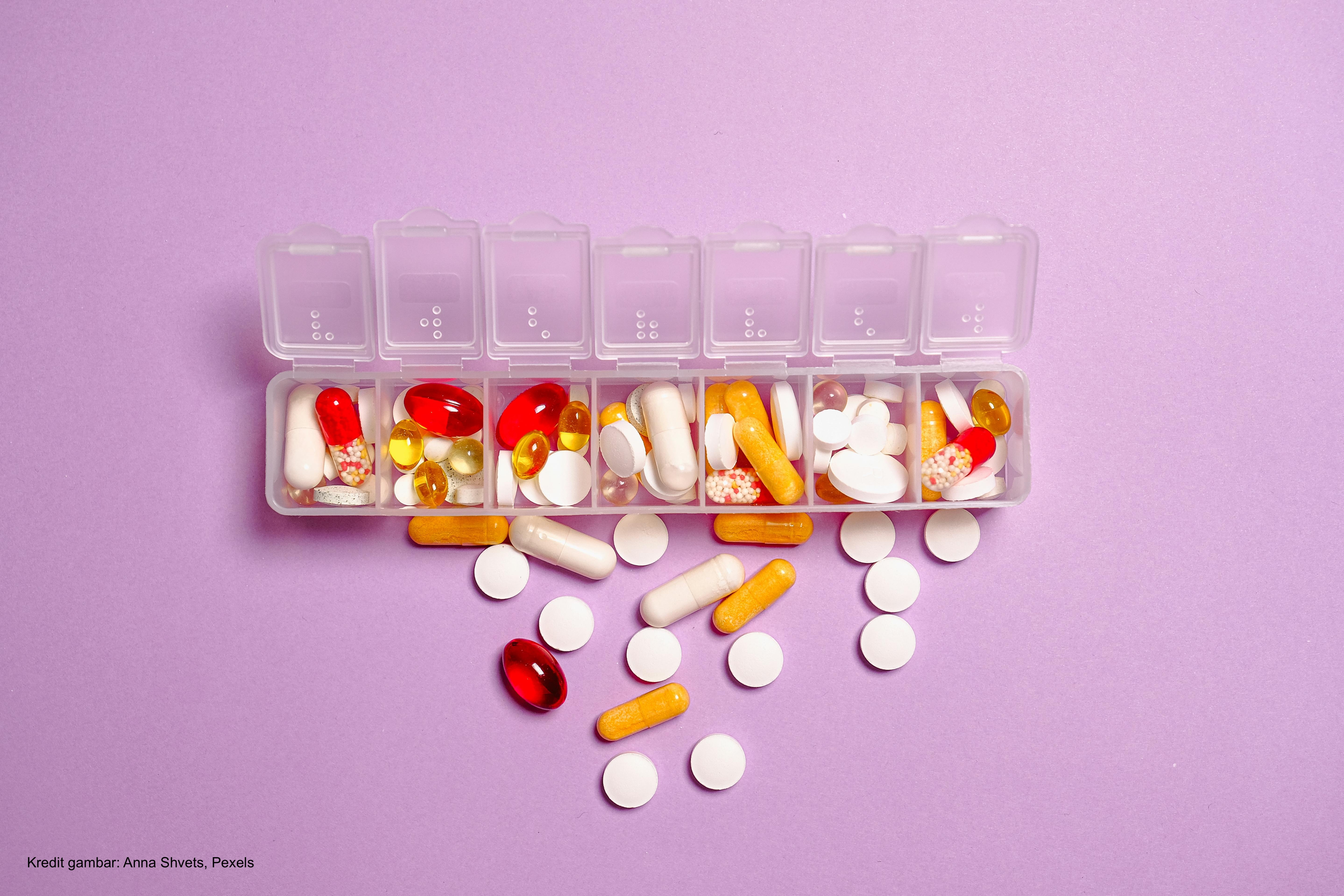 Photo Medication Pills on White Plastic Container